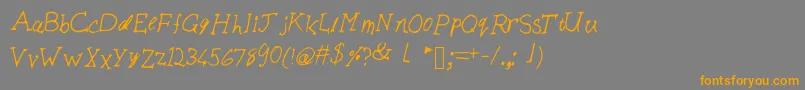 フォントBiscuits – オレンジの文字は灰色の背景にあります。