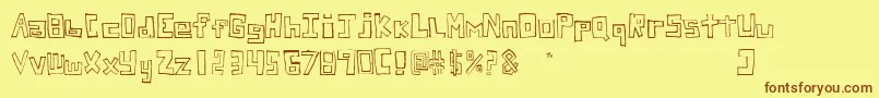 フォントStuckFont – 茶色の文字が黄色の背景にあります。