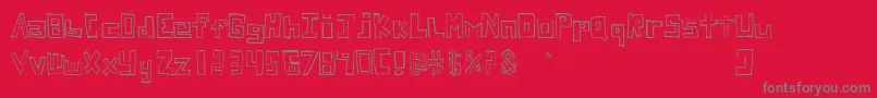 Fonte StuckFont – fontes cinzas em um fundo vermelho
