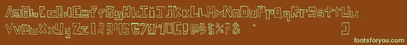 フォントStuckFont – 緑色の文字が茶色の背景にあります。