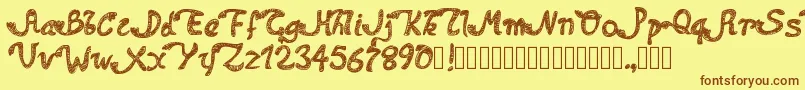 Pwdolphins Font – Brown Fonts on Yellow Background