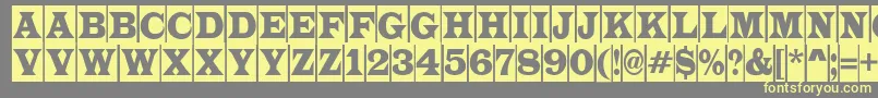 LatinotitulcmRegular Font – Yellow Fonts on Gray Background