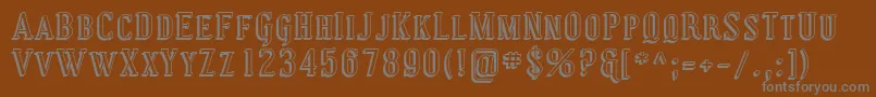 Coving29-fontti – harmaat kirjasimet ruskealla taustalla
