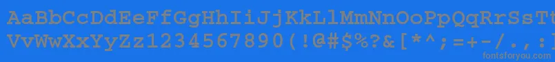 CourierBold-fontti – harmaat kirjasimet sinisellä taustalla