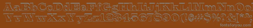 ALatinosh-fontti – harmaat kirjasimet ruskealla taustalla