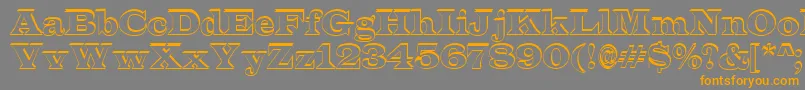 フォントALatinosh – オレンジの文字は灰色の背景にあります。