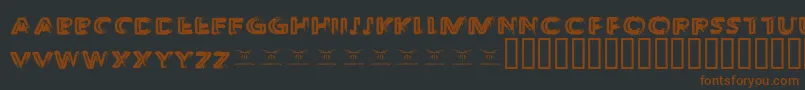Шрифт ThedecompozedRegular – коричневые шрифты на чёрном фоне