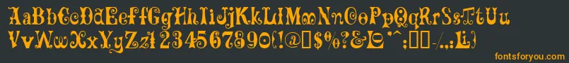 Tadaassk Font – Orange Fonts on Black Background