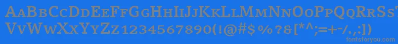 Czcionka CompatilLetterLtComBoldSmallCaps – szare czcionki na niebieskim tle