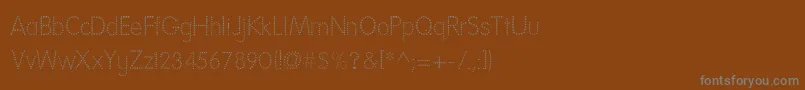 Police NationalFirstFontDotted – polices grises sur fond brun