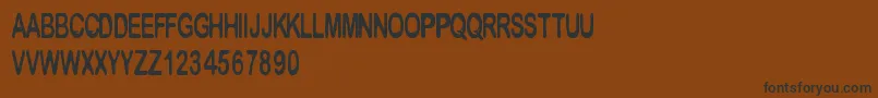 Cfmetropolis Font – Black Fonts on Brown Background