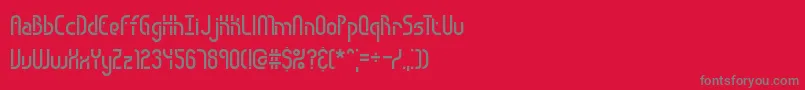 フォントObstacleBrk – 赤い背景に灰色の文字