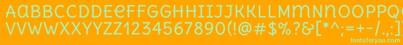 DeliusunicaseRegular Font – Green Fonts on Orange Background