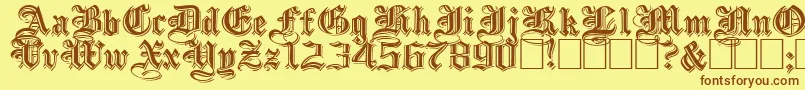 EmbossedblackwideNormal-fontti – ruskeat fontit keltaisella taustalla