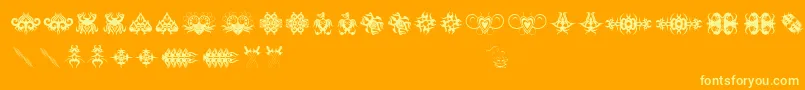 Tribaltattooaddict-Schriftart – Gelbe Schriften auf orangefarbenem Hintergrund