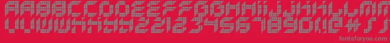 Czcionka KreasedRemix – szare czcionki na czerwonym tle
