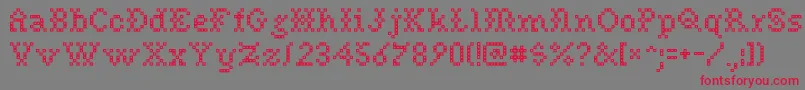 フォントNeedlepointRegular – 赤い文字の灰色の背景