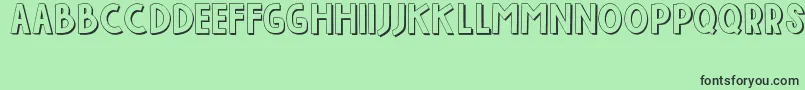 フォントIndahPapuaku – 緑の背景に黒い文字