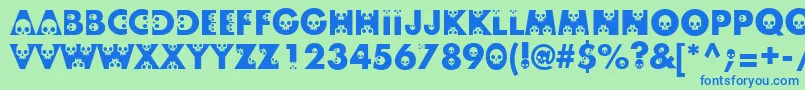フォントSkullphabetone – 青い文字は緑の背景です。