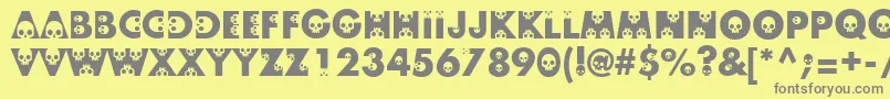 Skullphabetone Font – Gray Fonts on Yellow Background
