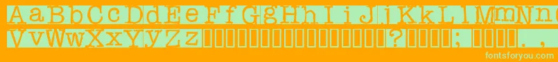 Rubberst Font – Green Fonts on Orange Background