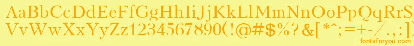 フォントKudrashovPlain – オレンジの文字が黄色の背景にあります。