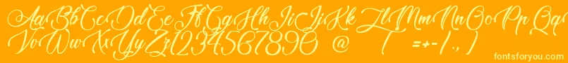 TaleOfHawks Font – Yellow Fonts on Orange Background