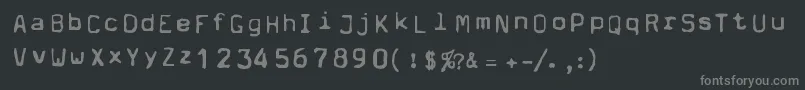 フォントDpm – 黒い背景に灰色の文字