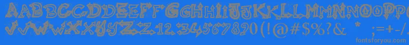 RaslaniUndaground-fontti – harmaat kirjasimet sinisellä taustalla