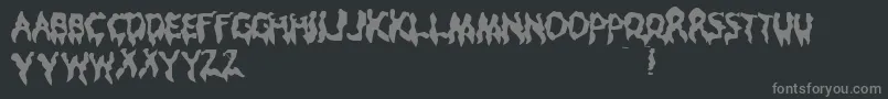 DroopyPoopy-fontti – harmaat kirjasimet mustalla taustalla