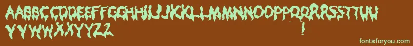 DroopyPoopy-fontti – vihreät fontit ruskealla taustalla