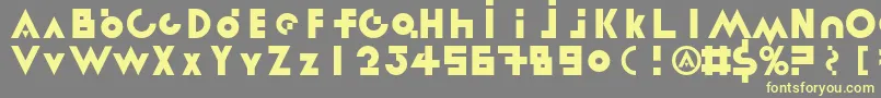 LinotypereneedisplayTypes-fontti – keltaiset fontit harmaalla taustalla