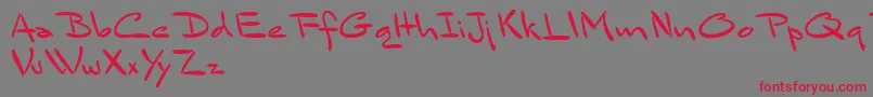 BluelminSandsfort-Schriftart – Rote Schriften auf grauem Hintergrund