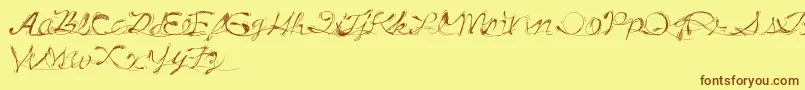 フォントDrunkTattoo – 茶色の文字が黄色の背景にあります。
