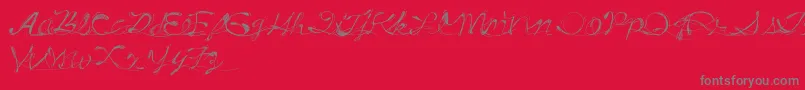 Czcionka DrunkTattoo – szare czcionki na czerwonym tle