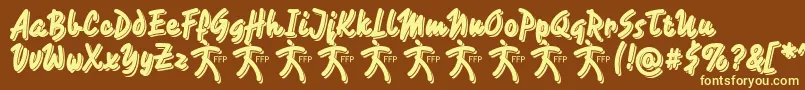 フォントCaminataOneDemoFfp – 黄色のフォント、茶色の背景