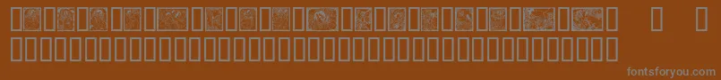 Angelsfairies-fontti – harmaat kirjasimet ruskealla taustalla