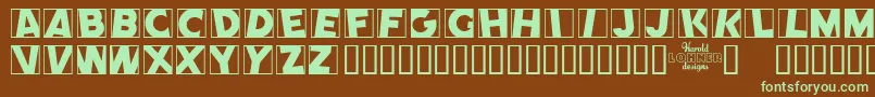 フォントCometPositive – 緑色の文字が茶色の背景にあります。
