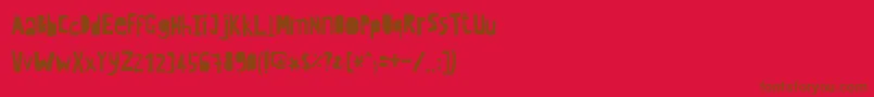 Police Crewhassanpositivecondensed – polices brunes sur fond rouge