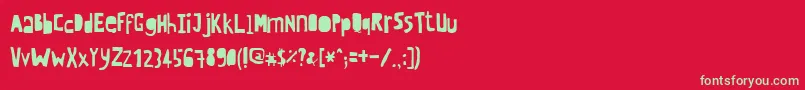 Crewhassanpositivecondensed-Schriftart – Grüne Schriften auf rotem Hintergrund