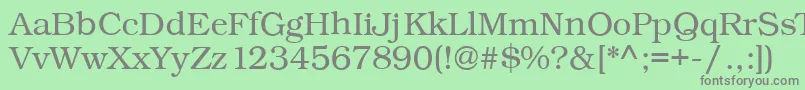 フォントKacstqurn – 緑の背景に灰色の文字