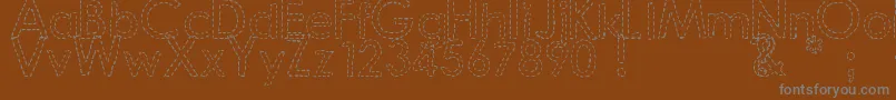 Шрифт DjbHandStitchedFont – серые шрифты на коричневом фоне