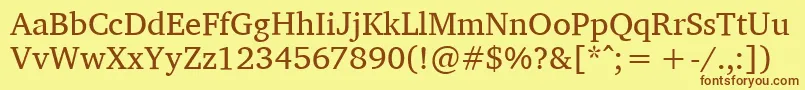 フォントCharisSil – 茶色の文字が黄色の背景にあります。