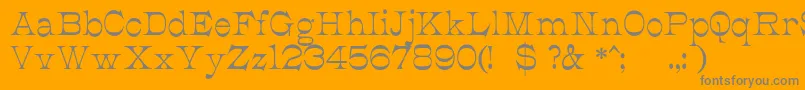 JmhCajitaRegular-Schriftart – Graue Schriften auf orangefarbenem Hintergrund