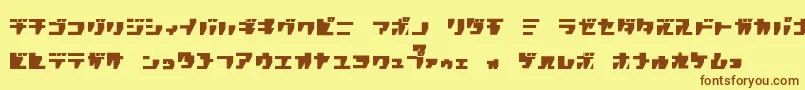 フォントRpgk ffy – 茶色の文字が黄色の背景にあります。