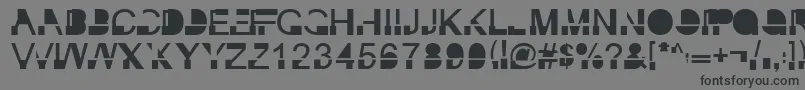 フォントInkieblockRegular – 黒い文字の灰色の背景