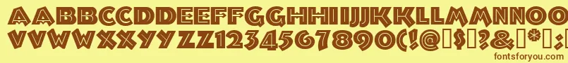 フォントTroglodytenf – 茶色の文字が黄色の背景にあります。