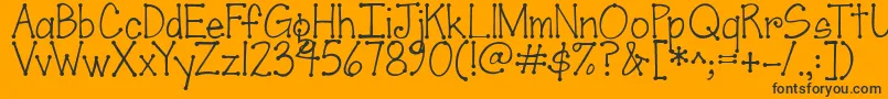 Fonte Jandascrapgirldots – fontes pretas em um fundo laranja