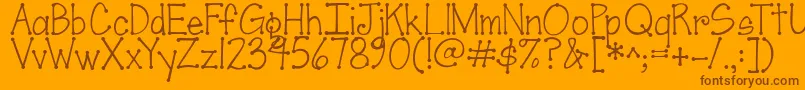 Jandascrapgirldots-Schriftart – Braune Schriften auf orangefarbenem Hintergrund