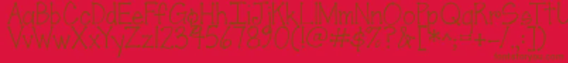 Fonte Jandascrapgirldots – fontes marrons em um fundo vermelho